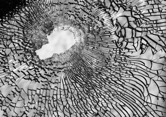 Bullet Hole from Gang Shooting, One Dead