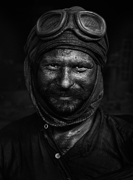 The Black Santa Claus: a Worker in a Steel Factory