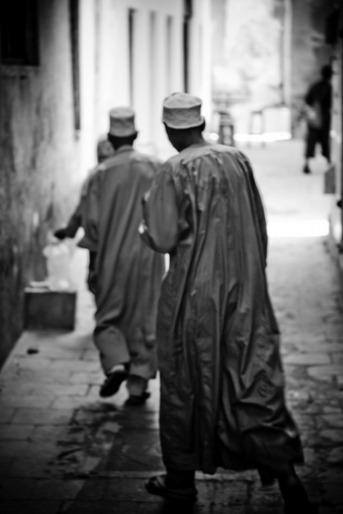 answering the call to prayer, stonetown, zanzibar