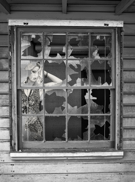 Girl in a Broken Window