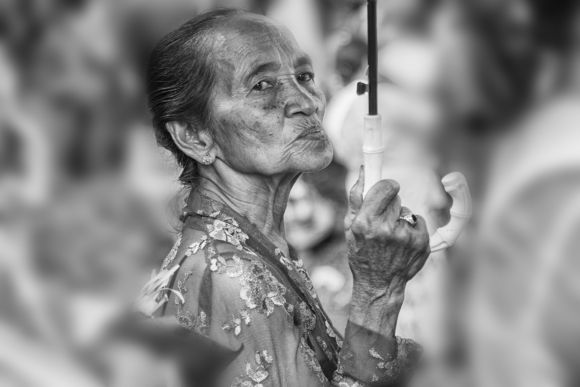 Proud Balinese Woman Holding Umbrella