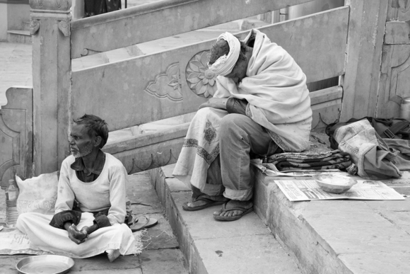 Beggars at the Ganges river, India