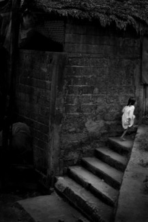 streetchild running stairs