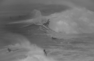 Surfers In Fog