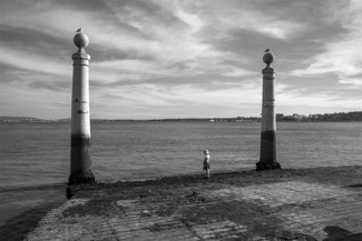 Girl Between Columns