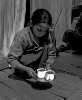 Girl serving tea