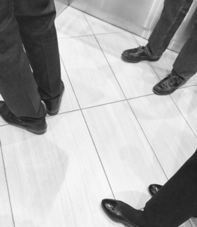 Men in Elevator