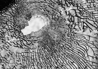 Bullet Hole from Gang Shooting, One Dead