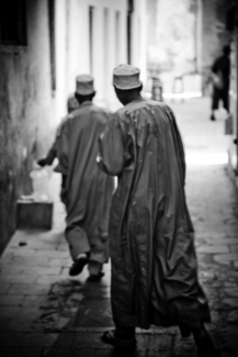 answering the call to prayer, stonetown, zanzibar