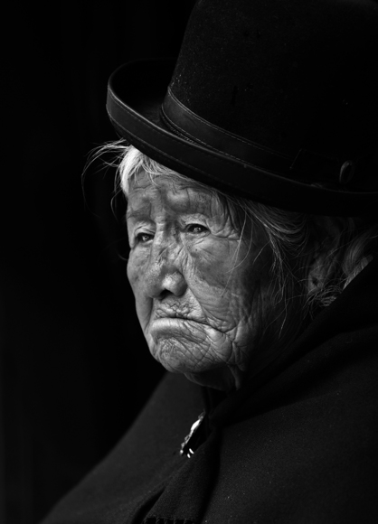 Sad Lady in bowler hat