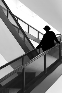 Man on an Escalator