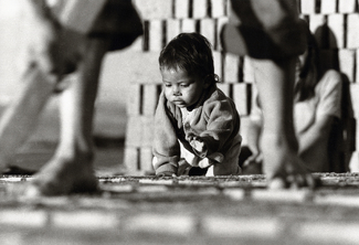 Baby Helping Brick Laying