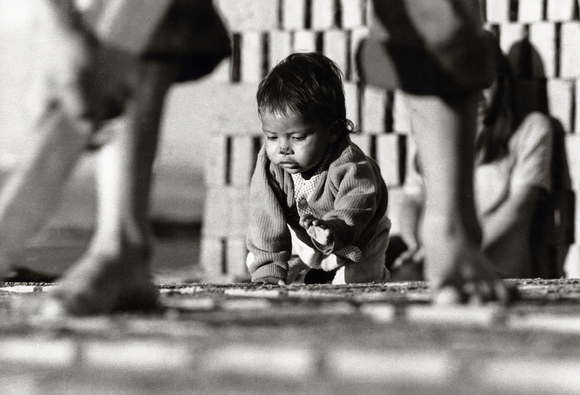 Baby Helping Brick Laying