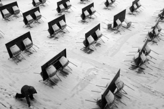Child Plays Among Tables