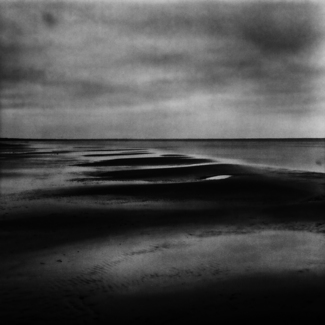De silence of sand.