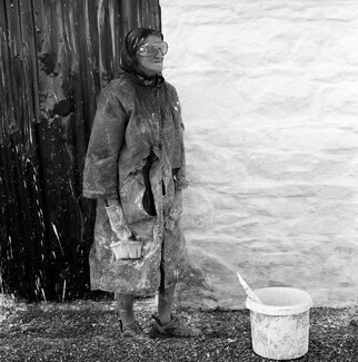 Mary Durack, white washing her house Mary Durack, white washing her house