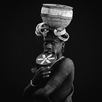 Woman of Mursi tribe wearing lip plate, Ethiopia Woman of Mursi tribe wearing lip plate, Ethiopia