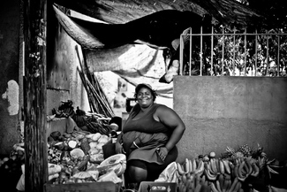 Smiler - roadside fruit & veg stall seller. Smiler - roadside fruit & veg stall seller.