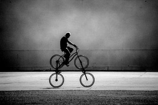 Man on Quadricycle Man on Quadricycle