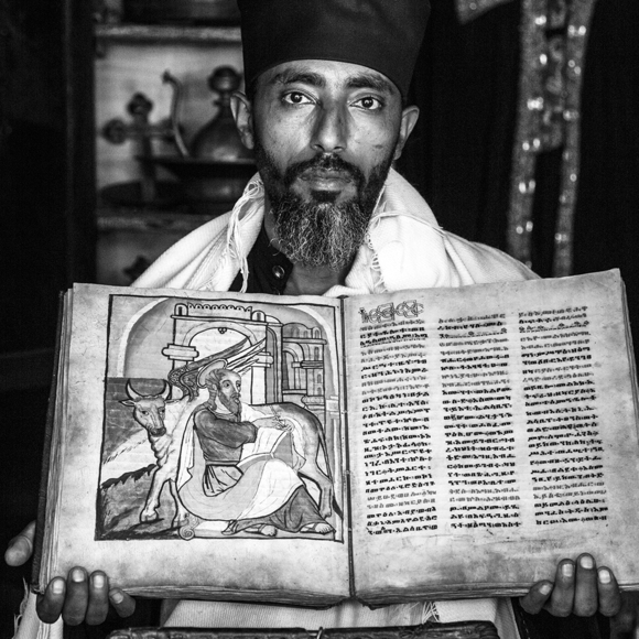Priest with Bible at Azua Maryam Monastery
