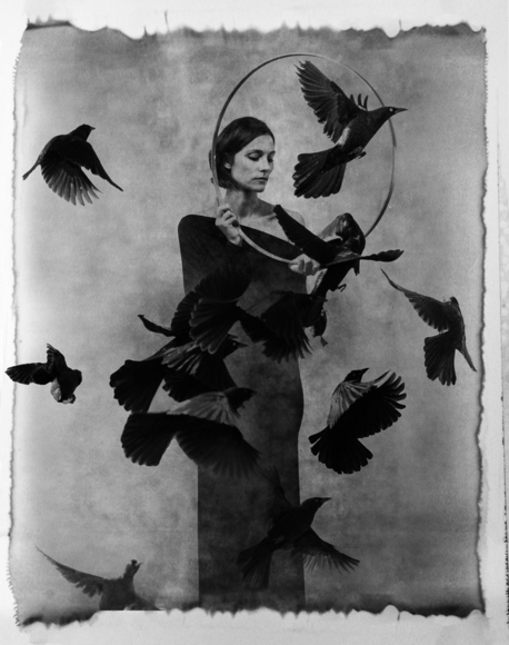 Woman with performing crows