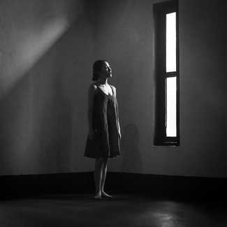 Girl in window light Girl in window light