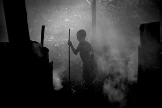 Hazardous child labour in the toxic charcoal plant Hazardous child labour in the toxic charcoal plant