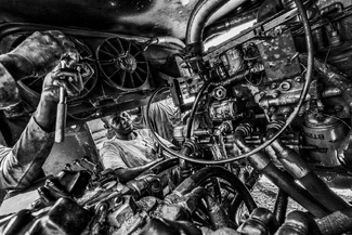 Juanito, Fixing an Engine Juanito, Fixing an Engine