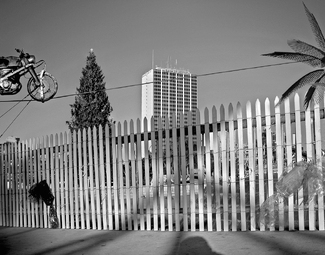 Motorcycle and Fence Motorcycle and Fence