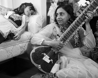 Aryani in Window Seat Listening to Mama Play Aryani in Window Seat Listening to Mama Play