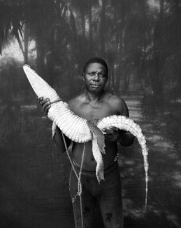 Abdou with rescued crocodile Abdou with rescued crocodile