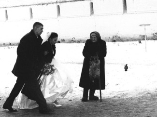 Bride, beggar and bird