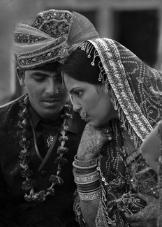 Consulting with his bride Consulting with his bride