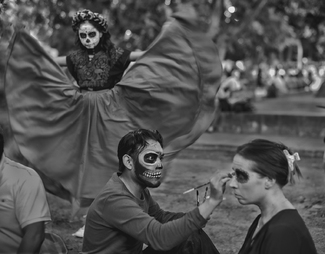 Artist and young dancing Catrina Artist and young dancing Catrina