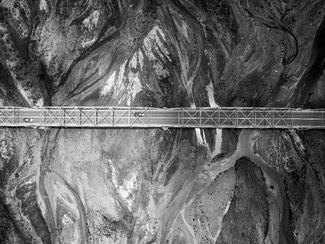 Iron bridge across a dry river