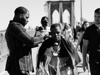 A scene at the Brooklyn Bridge A scene at the Brooklyn Bridge