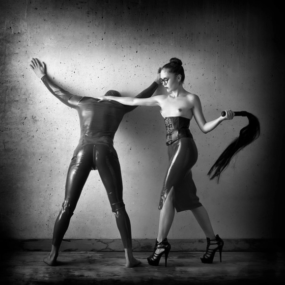 the mistress wipping her slave