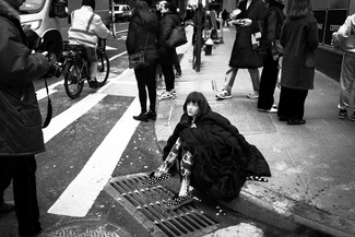 Woman Sitting on Curb Woman Sitting on Curb