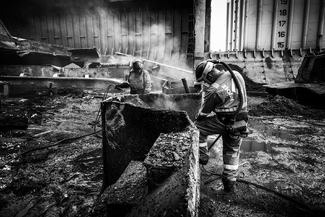 A shipbreaker at works II A shipbreaker at works II