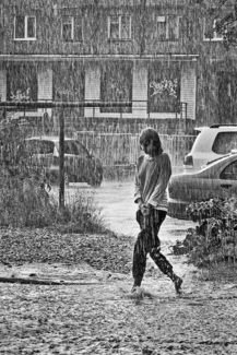 In the rain, one girl