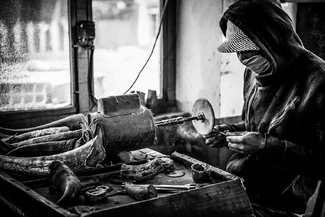 Worker at Zebu Horn Factory Worker at Zebu Horn Factory