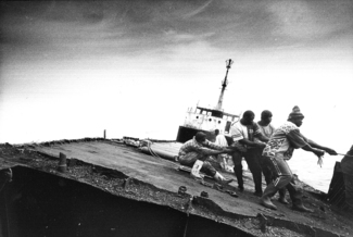 Clandestine Workers in Mauritania Dismantling a Boat (Including Asbestos)