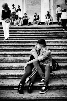 Young Couple Kissing at Spanish Steps Young Couple Kissing at Spanish Steps