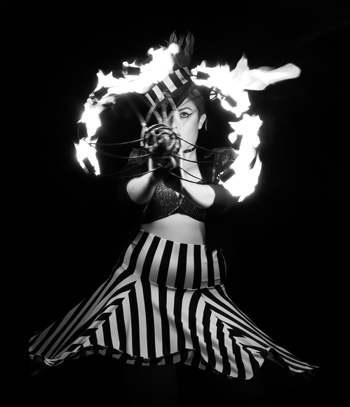 Lady in Top Hat with Fire.