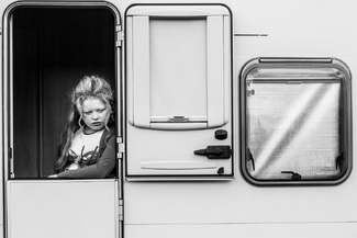 Irish Traveller Girl in Caravan Ballanisloe Horse Fair Irish Traveller Girl in Caravan Ballanisloe Horse Fair