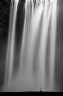 Man and waterfall Man and waterfall