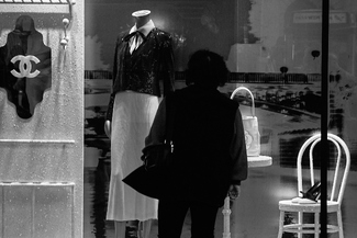 In front of a boutique Window In front of a boutique Window