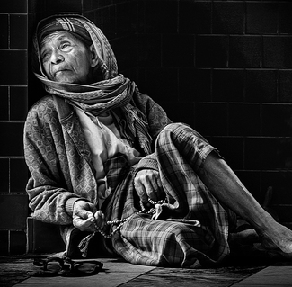 Old woman praying