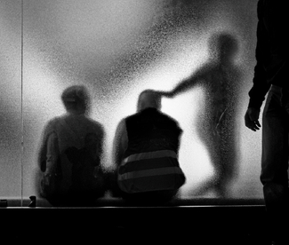 Behind the frosted glass window Behind the frosted glass window